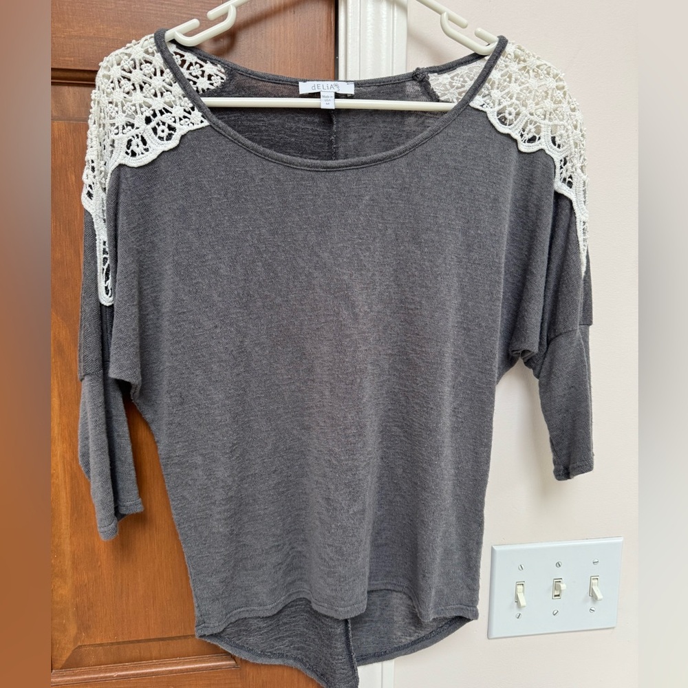 Delia's grey pullover blouse in size Medium